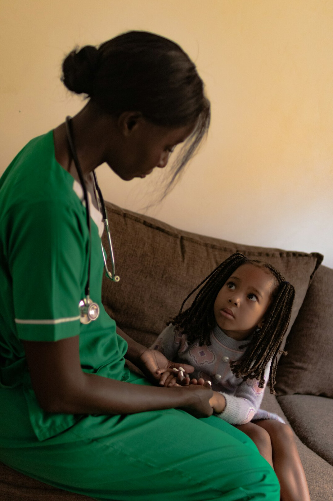 Doctor consulting with a patient in a bright clinic office