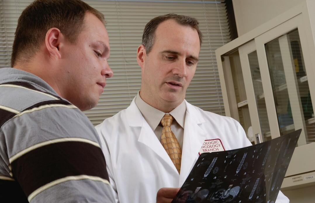 doctor explaining insurance to patient
